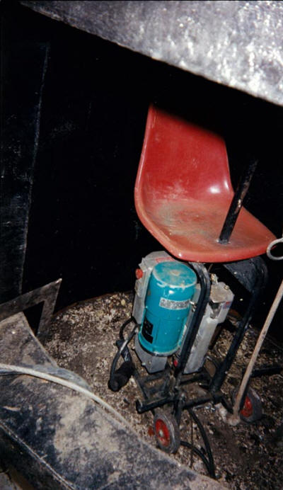 Electric powered Bolson Chair utilized to access the inside liner of two 120' tall exhaust stacks in order to perform repairs during a refurbishment project.