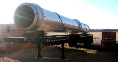 101' freestanding,&nbsp;double-walled, double-breached exhaust stack at a brick plant.  Carbon steel outside shell, stainless steel inside liner and a tuned mass vibration damper.  