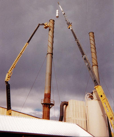 Installing a replacement liner breach and cone section into one of two 120' tall exhaust stacks.  Each stack was refurbished while erect utilizing a 131' tall man lift for access as well as a&nbsp;60 ton capacity hydraulic truck crane for lifting.