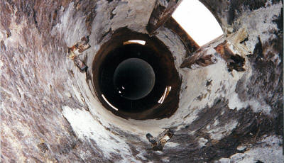 Existing failed expansion joint and ID of the outer shell of two 120' exhaust stacks to be refurbished.