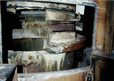 Existing failed expansion joint and ID of the outer shell of two 120' exhaust stacks to be refurbished.
