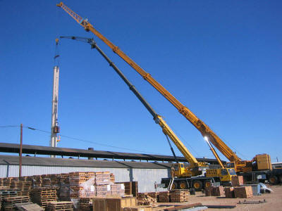 Setting the top section of a 101' freestanding exhaust stack at 131' radius.