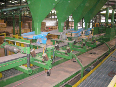 Slider-bed belt conveyor and sand application line.