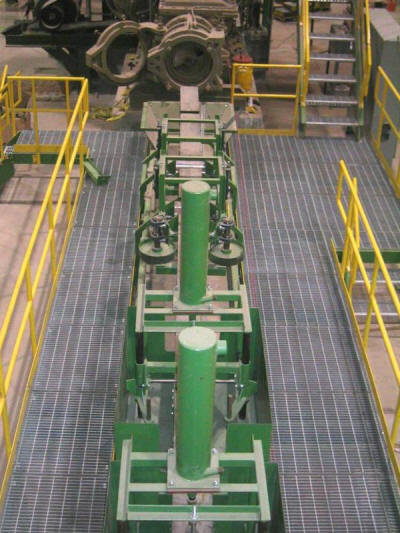 Clay brick extrusion line - texturing, logo and slurry application with related platforms and walkways.