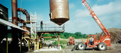 Setting a wet scrubber vessel for a calcine kiln.