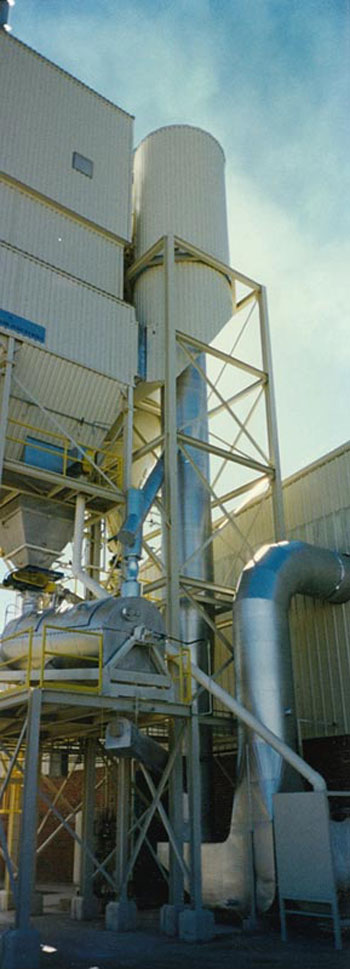 Enhanced lime injection scrubber system including insulation, lagging, painting, a penthouse and miscellaneous retrofits.