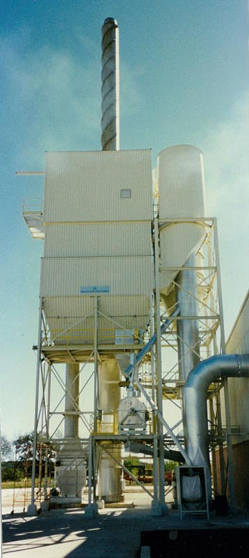 Enhanced lime injection scrubber system including insulation, lagging, painting, a penthouse and miscellaneous retrofits.
