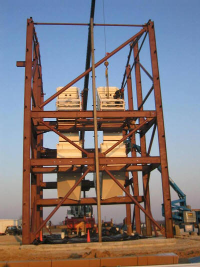 Four, triple 5’x10’ over triple 5’x10’ screens and related equipment in a custom screen tower structure for a frac sand plant.