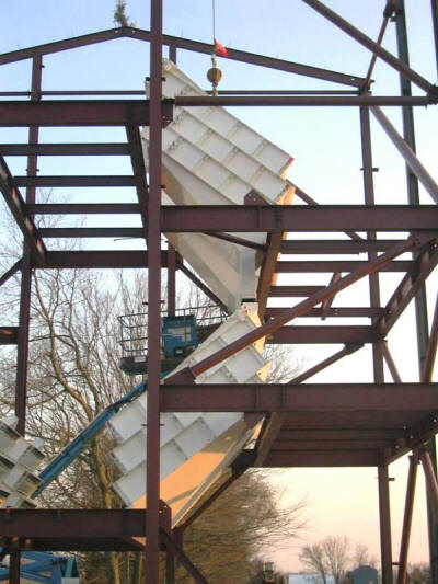 Four, triple 5’x10’ over triple 5’x10’ screens and related equipment in a custom screen tower structure for a frac sand plant.