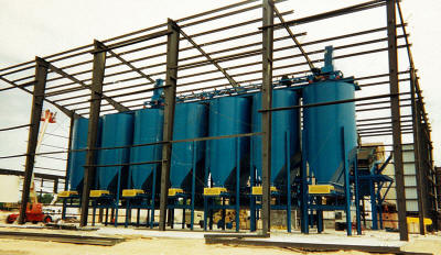 Seven 100 ton silos with belt feeders for clay and clay products